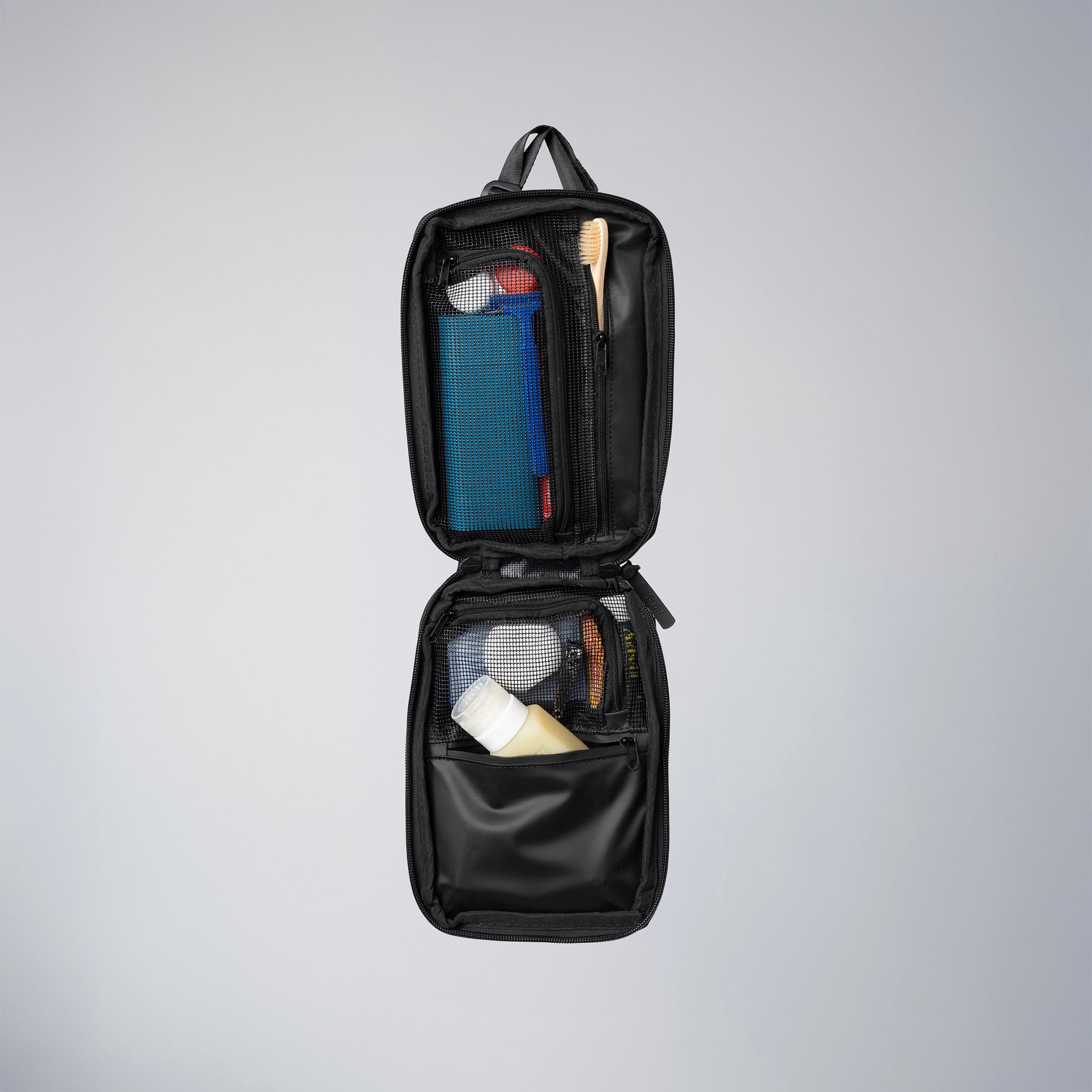 Explorer SLIM™ Toiletry Bag - Traveling Lighter
